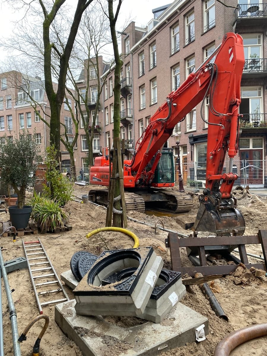 A construction site with a crane and other construction equipment