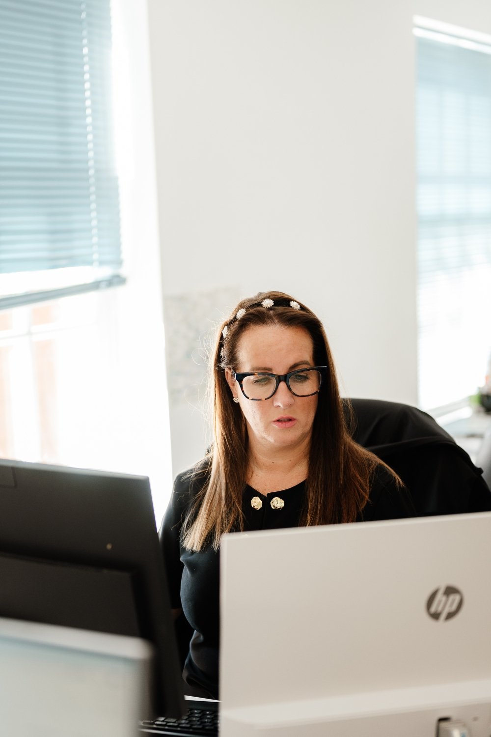 Kirsty Hero 1 a red truck parked in front of a building